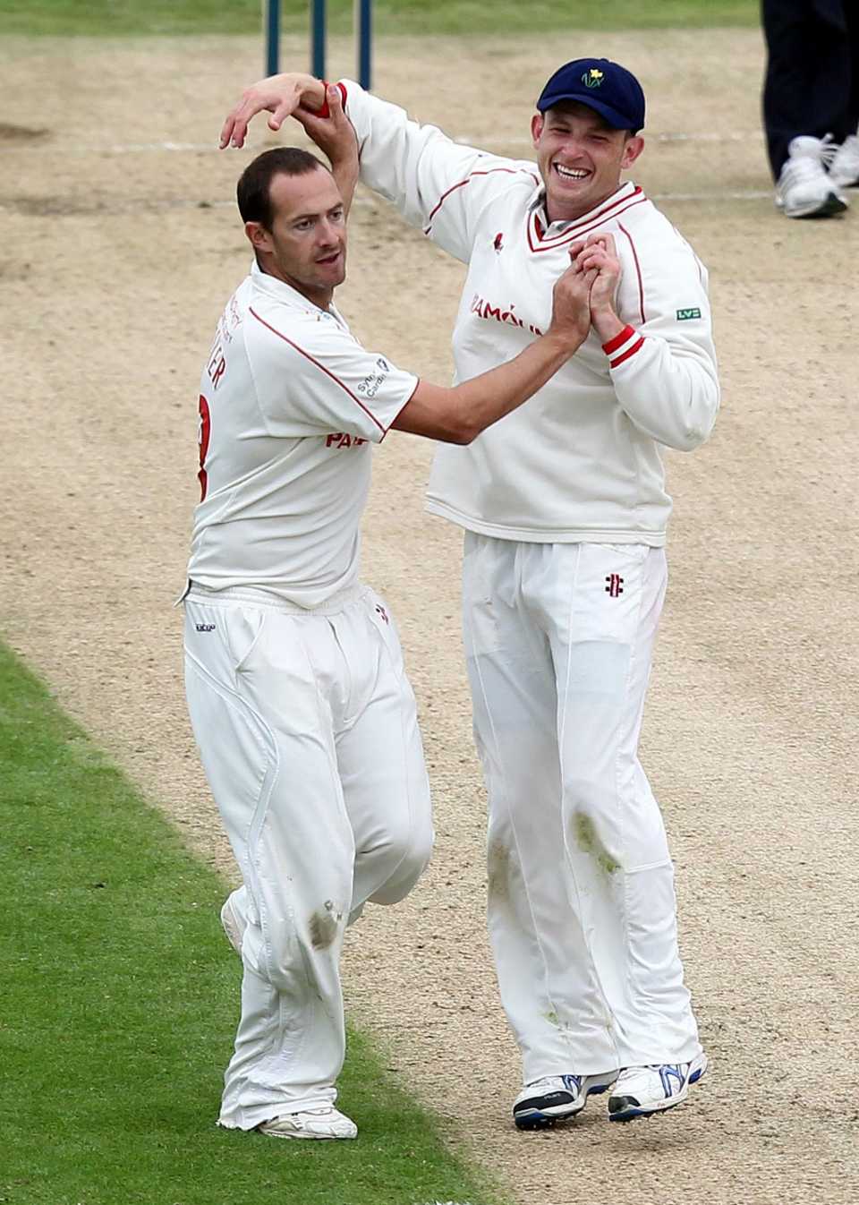 Dean Cosker celebrates one of three wickets against Kent