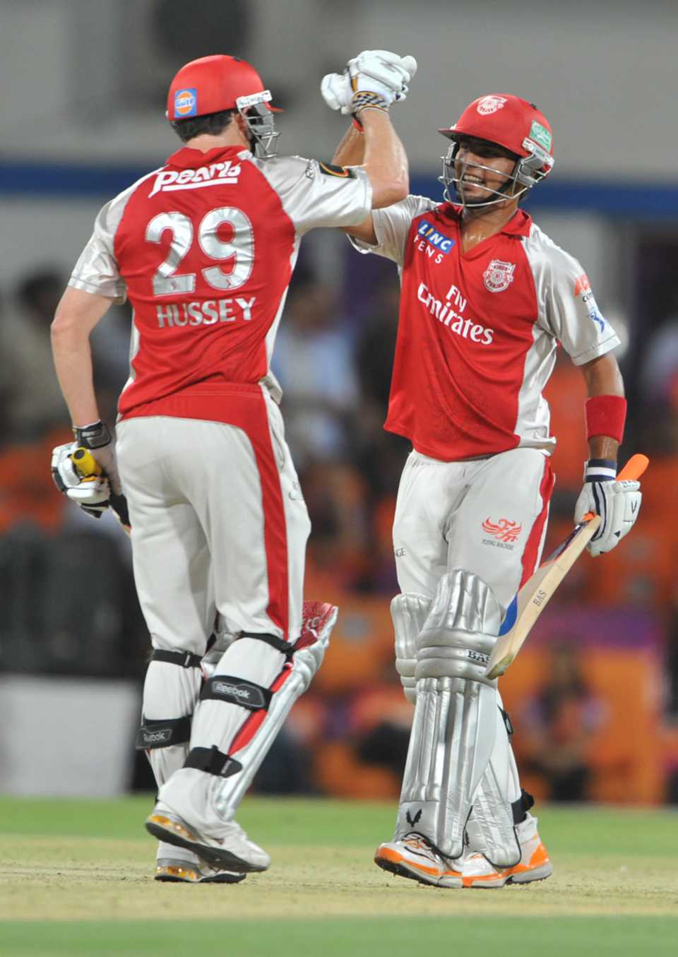 David Hussey and Mandeep Singh celebrate Punjab's win