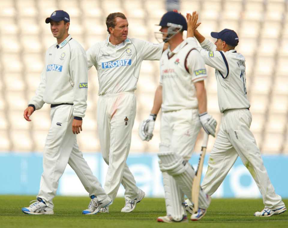 Dominic Cork's four wickets chipped away at his old county