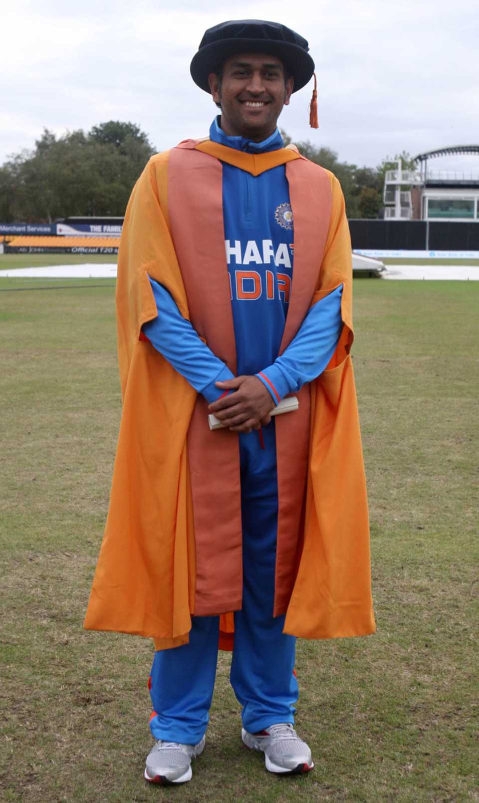 MS Dhoni poses with his honorary doctorate from Leicester's De Montfort University, Leicestershire v Indians, Twenty20, Leicester, August 29, 2011