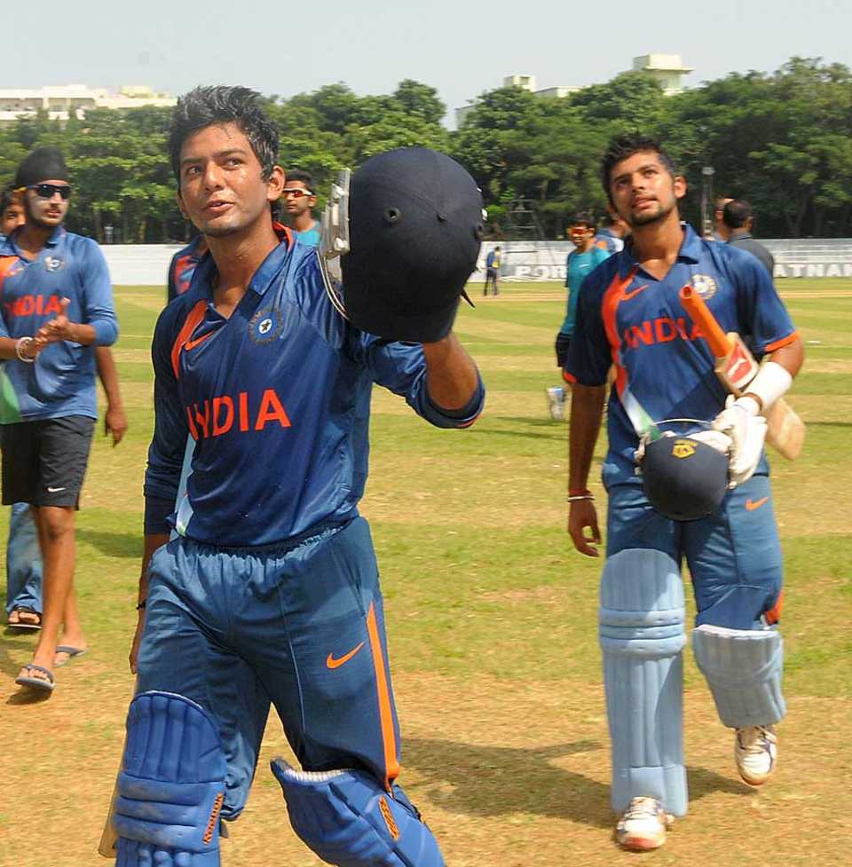 Unmukt Chand and Manan Vohra celebrate victory