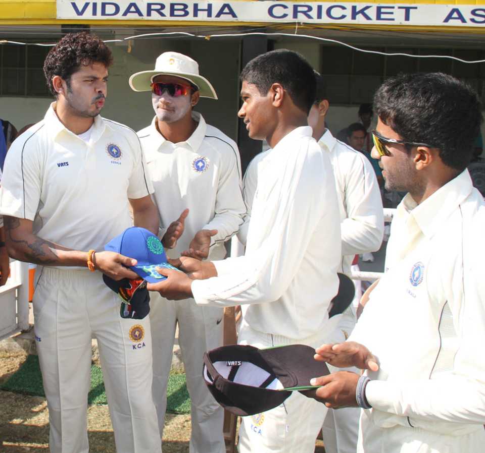 Sreesanth hands Sanju Samson his cap on his first-class debut 
