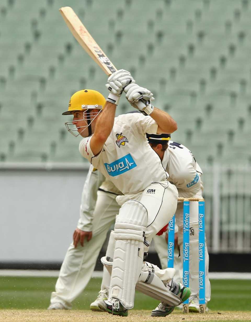 Liam Davis drives during his final day century