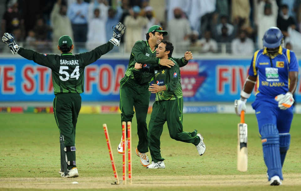 Saeed Ajmal is congratulated on dismissing Thisara Perera, Pakistan v Sri Lanka, 3rd ODI, Dubai, November 18, 2011