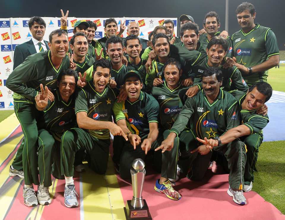 An elated Pakistan team with the trophy after winning the only T20I