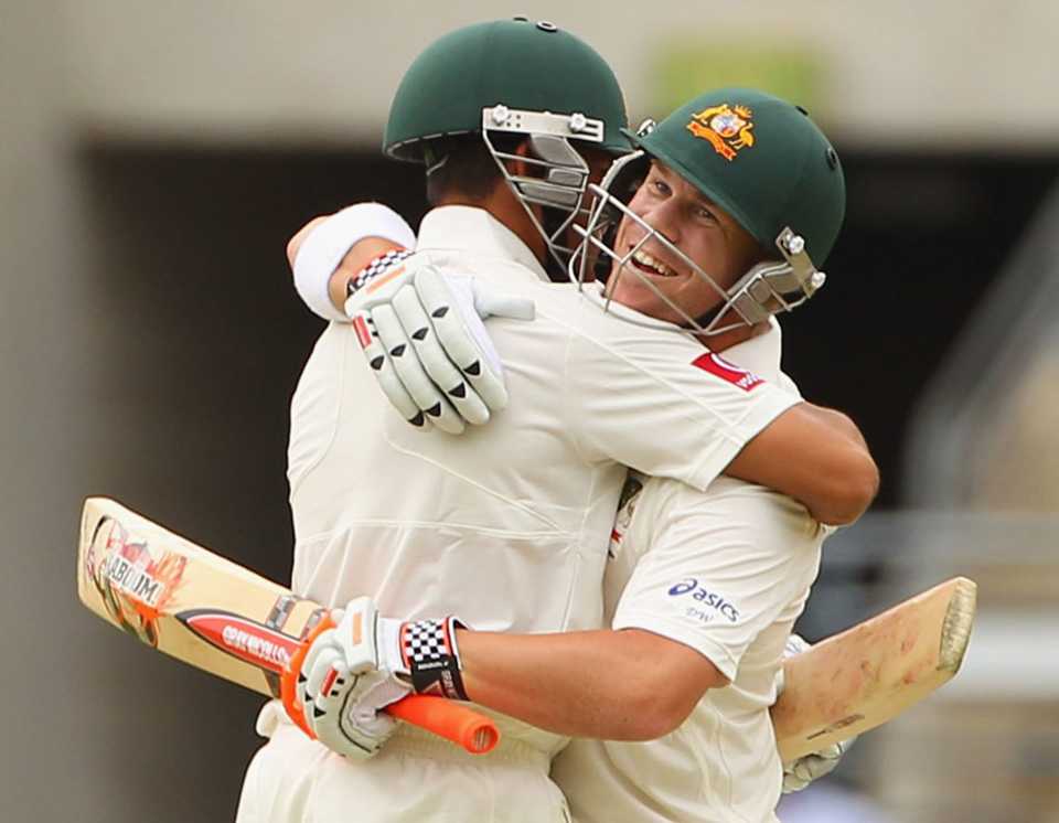 Usman Khawaja and David Warner embrace after hitting the winning runs, Australia v New Zealand, 1st Test, Brisbane, 4th day, December 4, 2011