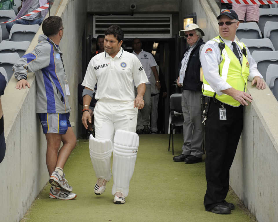 Sachin Tendulkar walks out before the start of play, Cricket Australia Chairman's XI v Indians, Canberra, 2nd day, December 16, 2011