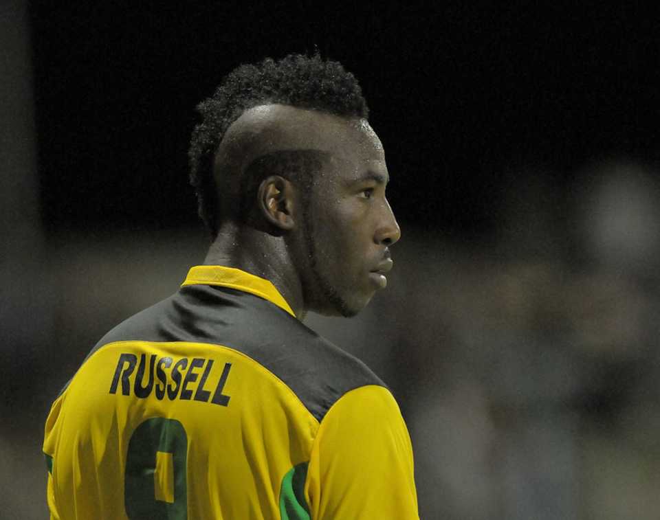 Andre Russell takes the field for Jamaica in the Caribbean T20