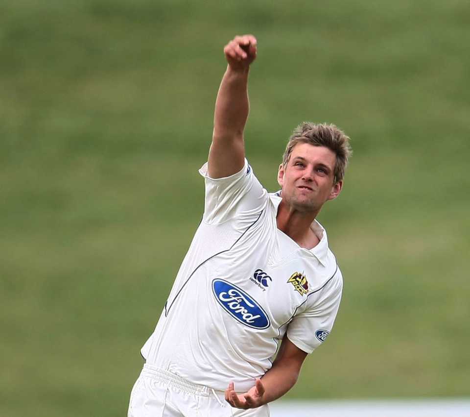 Sam Wells warms up ahead of a Plunket Shield match