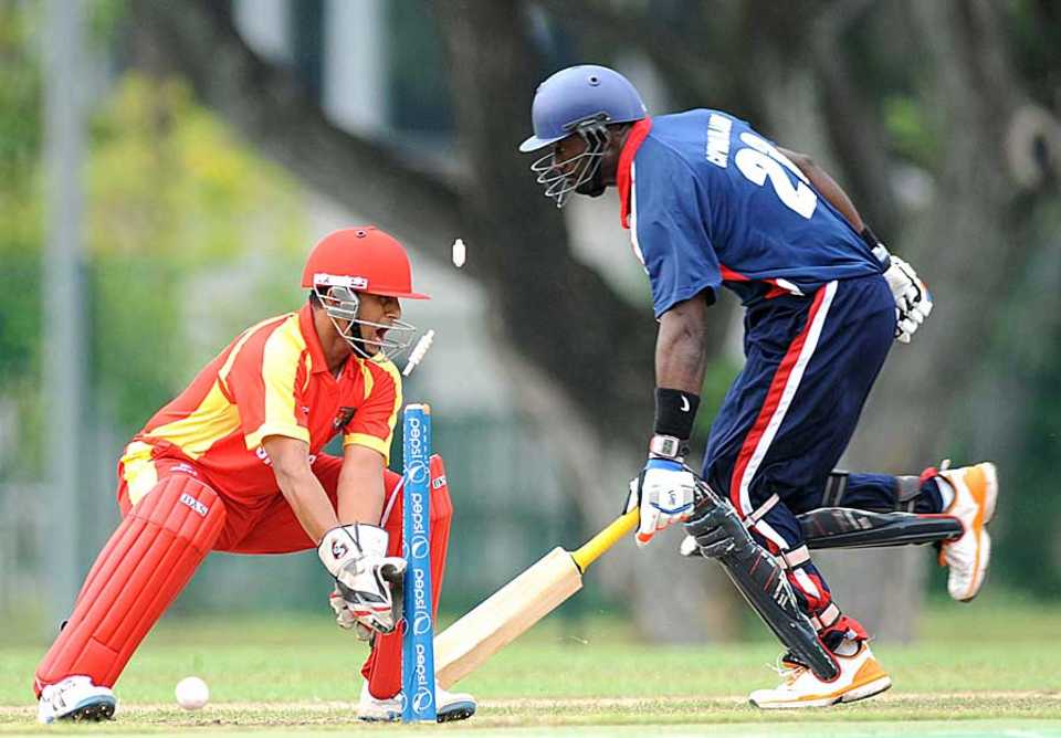Wicketkeeper-batsman Chetan Suryawanshi in action, Singapore v Cayman Islands, World Cricket League Division Five, Singapore, February 18, 2012