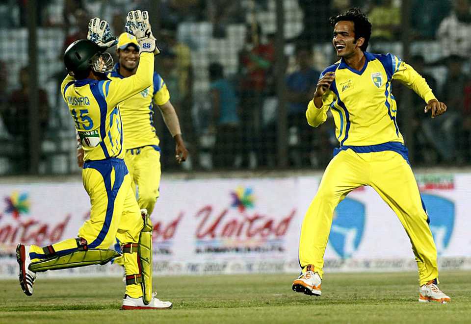 Saqlain Sajib celebrates a wicket with his team-mates