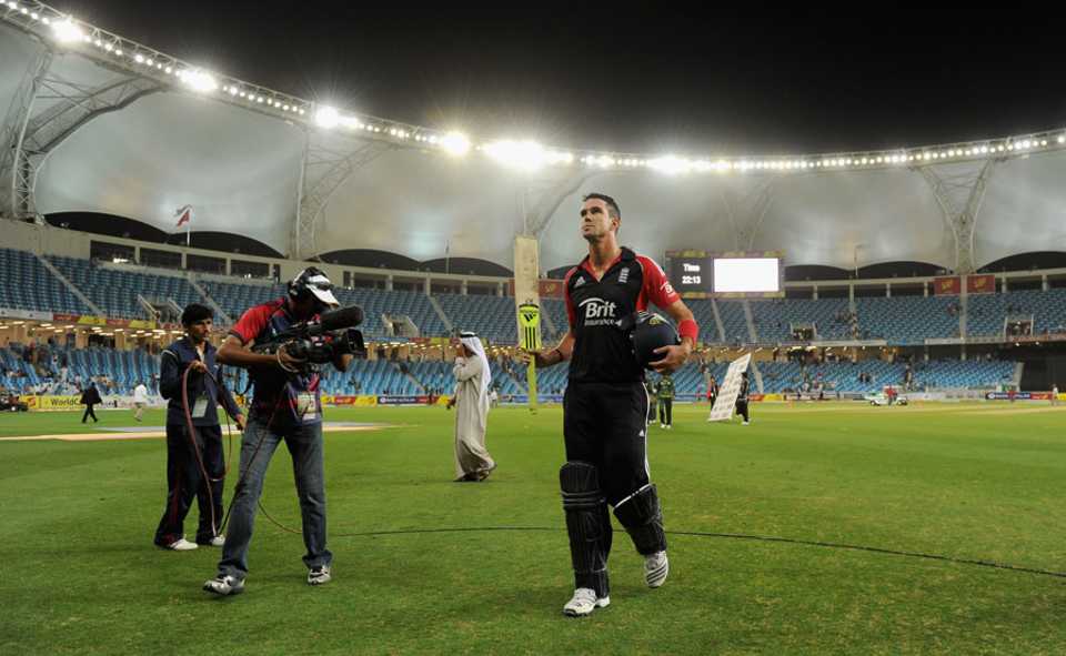 Kevin Pietersen walks off having led England to a series-clinching victory