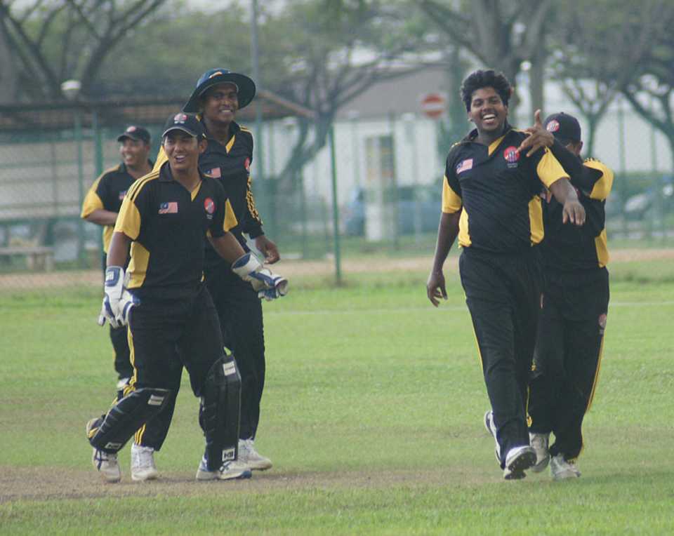 Hiran Ralalage celebrates one of his four match-winning wickets