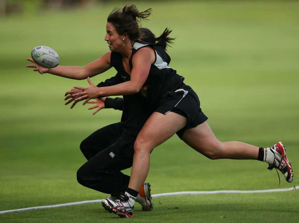 Kate Broadmore plays touch rugby after the fourth Twenty20 was washed out