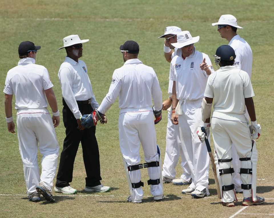 Graeme Swann exchanges words with Dilruwan Perera over a disputed catch