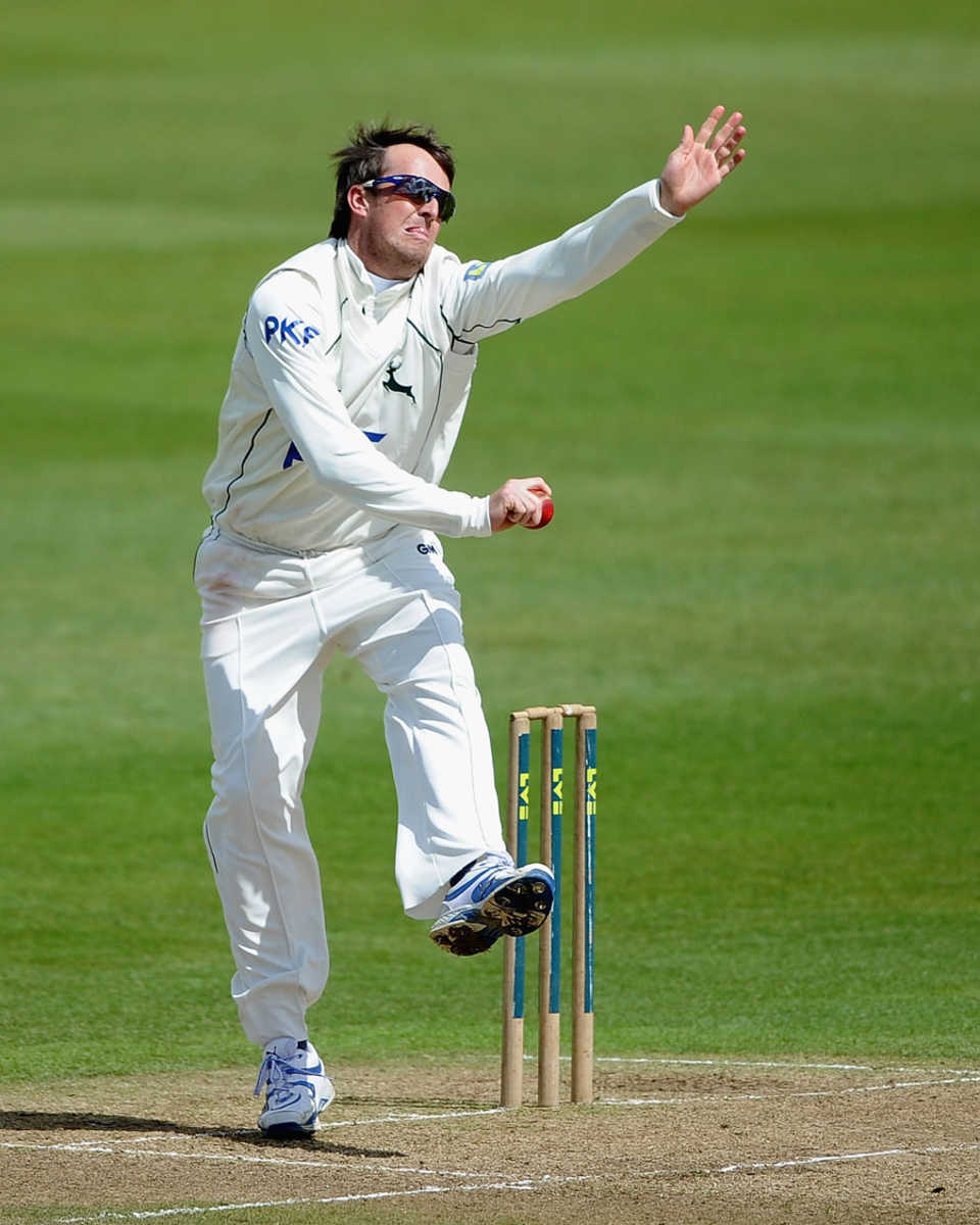 Graham Swann bowls from round the wicket