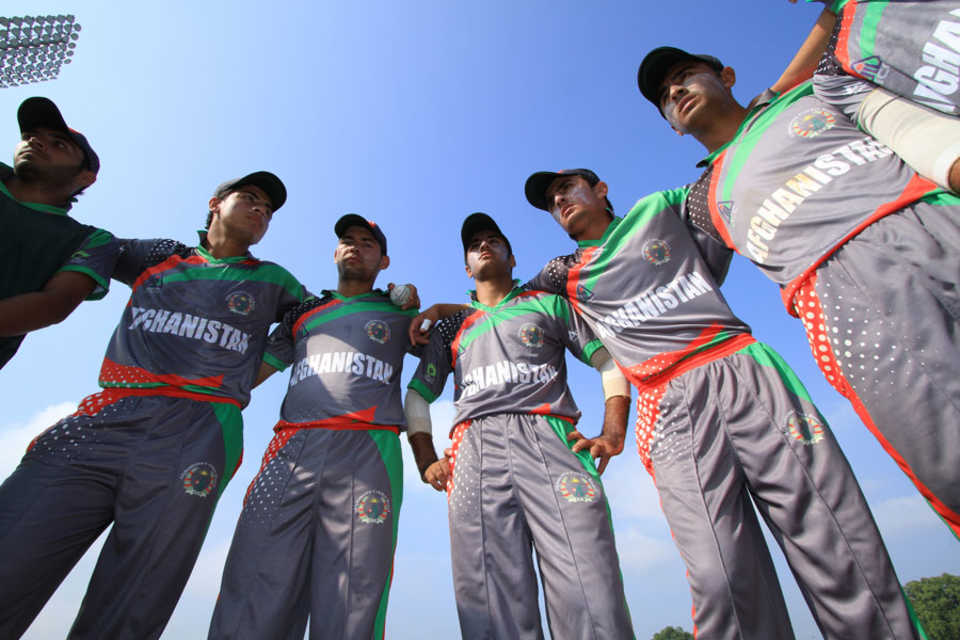The Afghanistan Under-19s team in a huddle