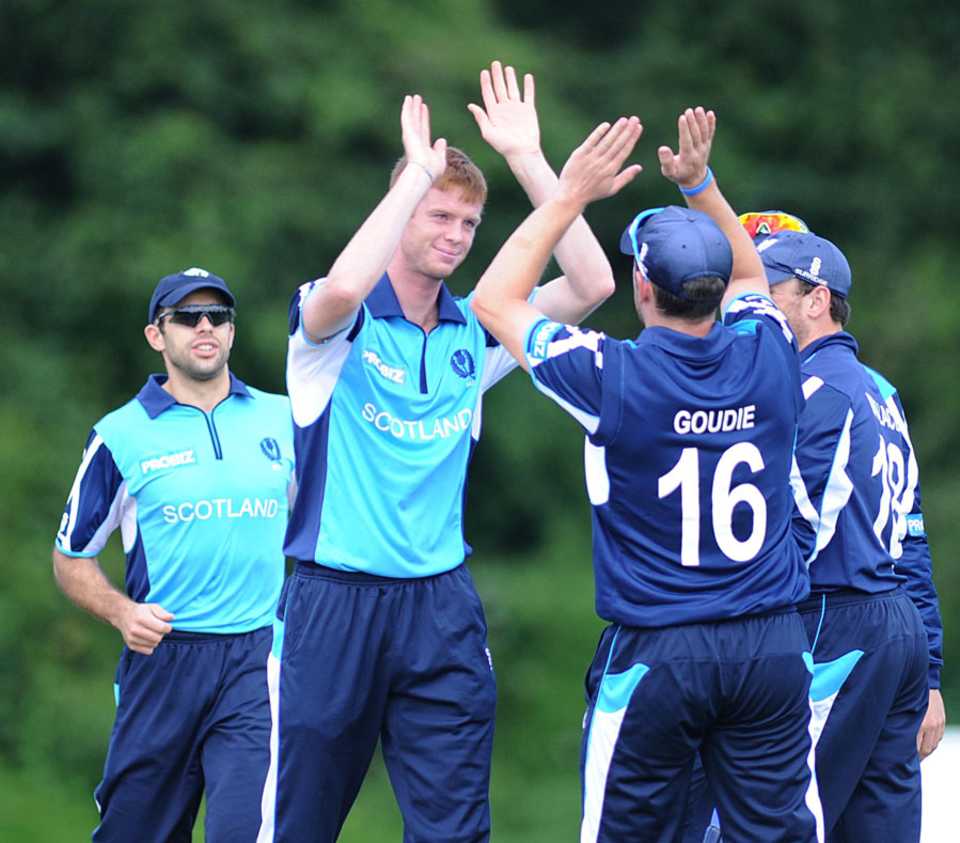 Scotland's Alasdair Evans celebrates an early wicket, Scotland v Canada, ICC World Cricket League Championship, Ayr, July 12, 2012