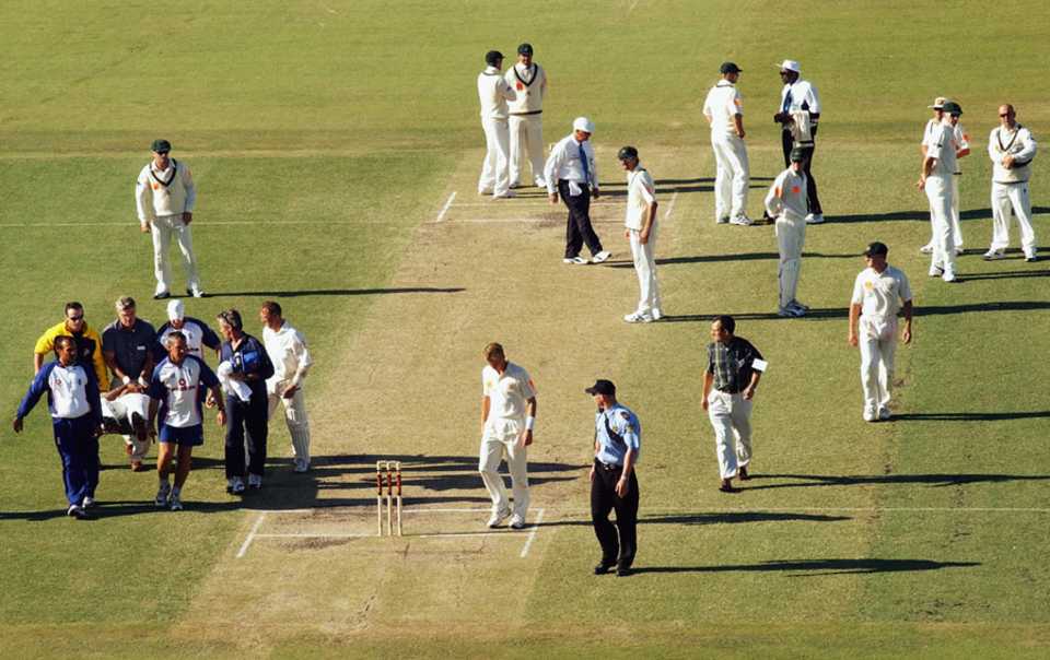 Alex Tudor is taken off on a stretcher after being hit by a ball from Brett Lee, Australia v England, 3rd Test, 3rd day, Perth, December 1, 2002