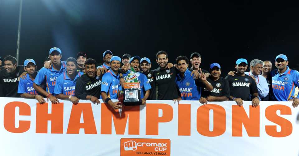 The Indian team pose with the Twenty20 trophy after their win against Sri Lanka on Tuesday