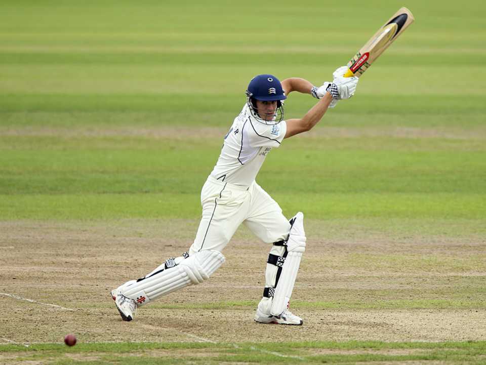 Neil Dexter drives square during his hundred