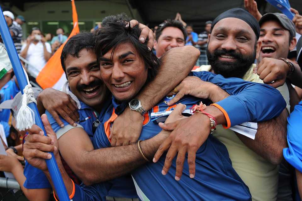 Kamal Passi celebrates the win with some Indian fans