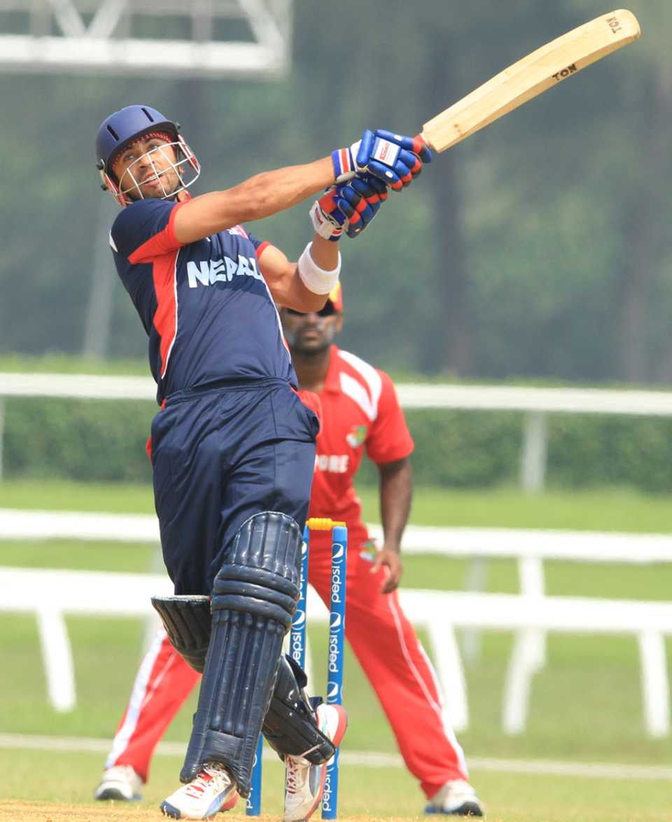 Gyanendra Malla plays a shot