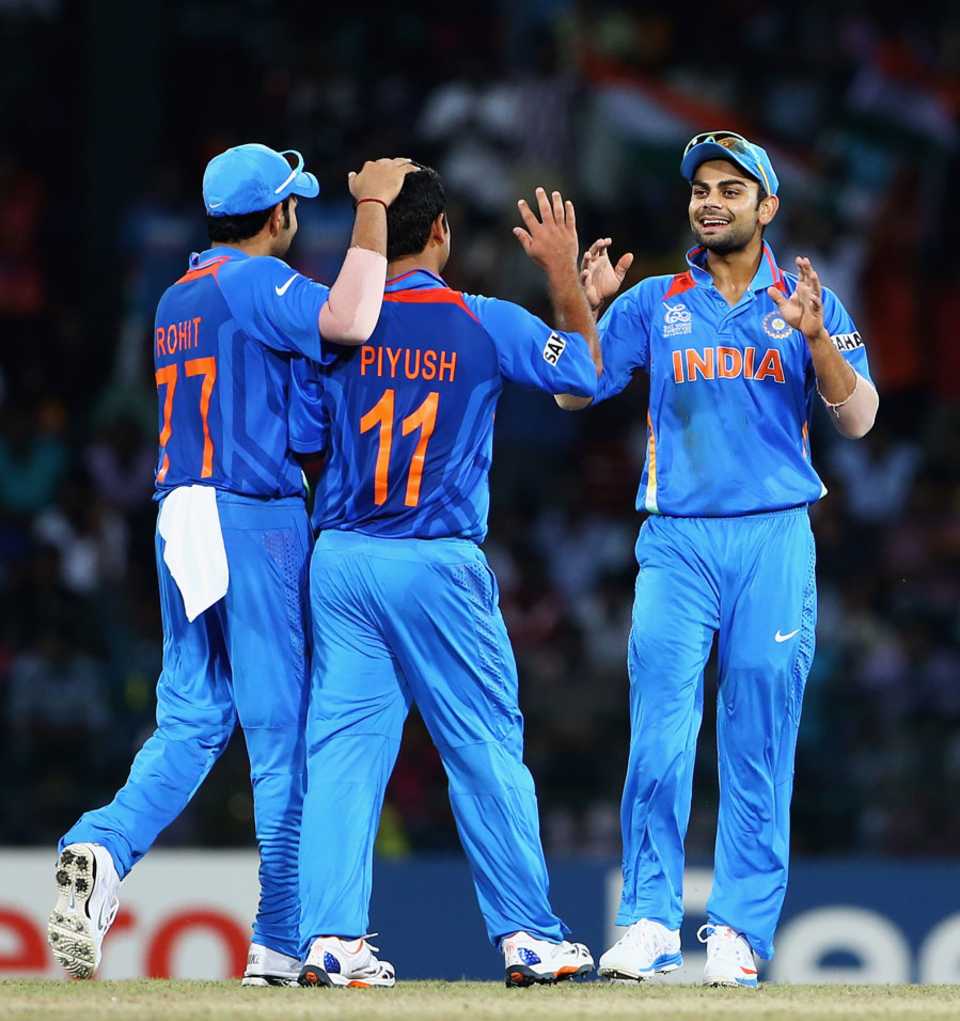 Piyush Chawla takes the plaudits from Rohit Sharma and Virat Kohli, England v India, World Twenty20, Group A, Colombo