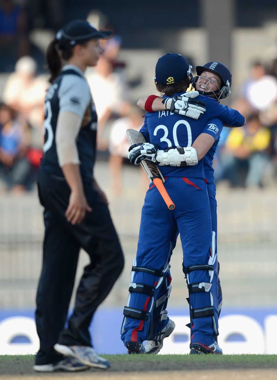 Sarah Taylor hugs Arran Brindle after England completed victory