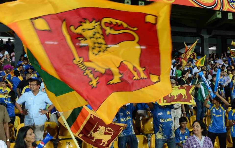 Sri Lankan fans celebrate their team's victory