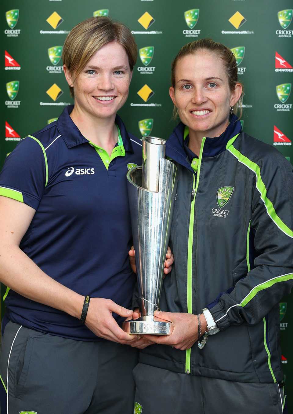 Jess Cameron and Jodie Fields with the Women's World T20 trophy
