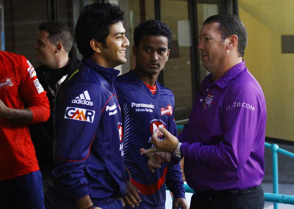 Delhi Daredevils' Unmukt Chand chats with umpire Johan Cloete