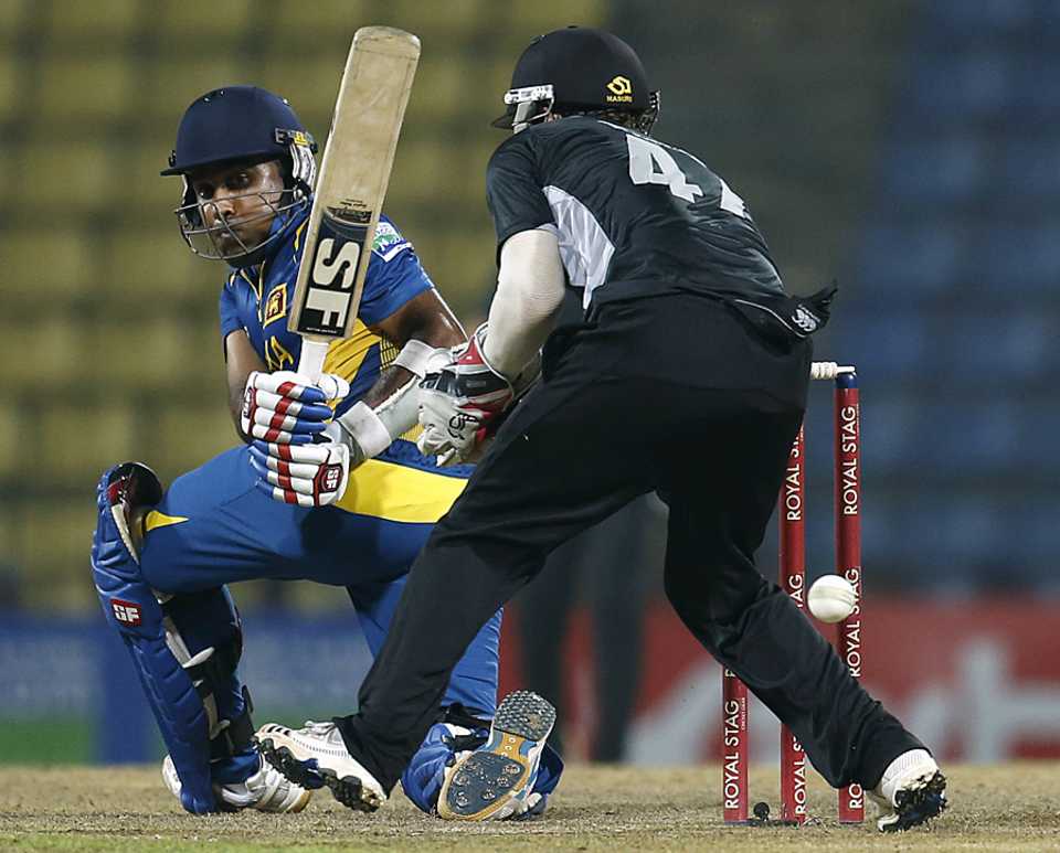 Mahela Jayawardene plays a ball behind the wicketkeeper