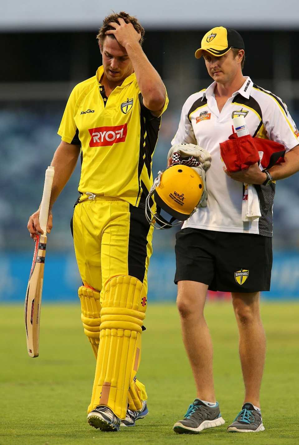 Mitchell Marsh walks off the field after suffering a hamstring injury