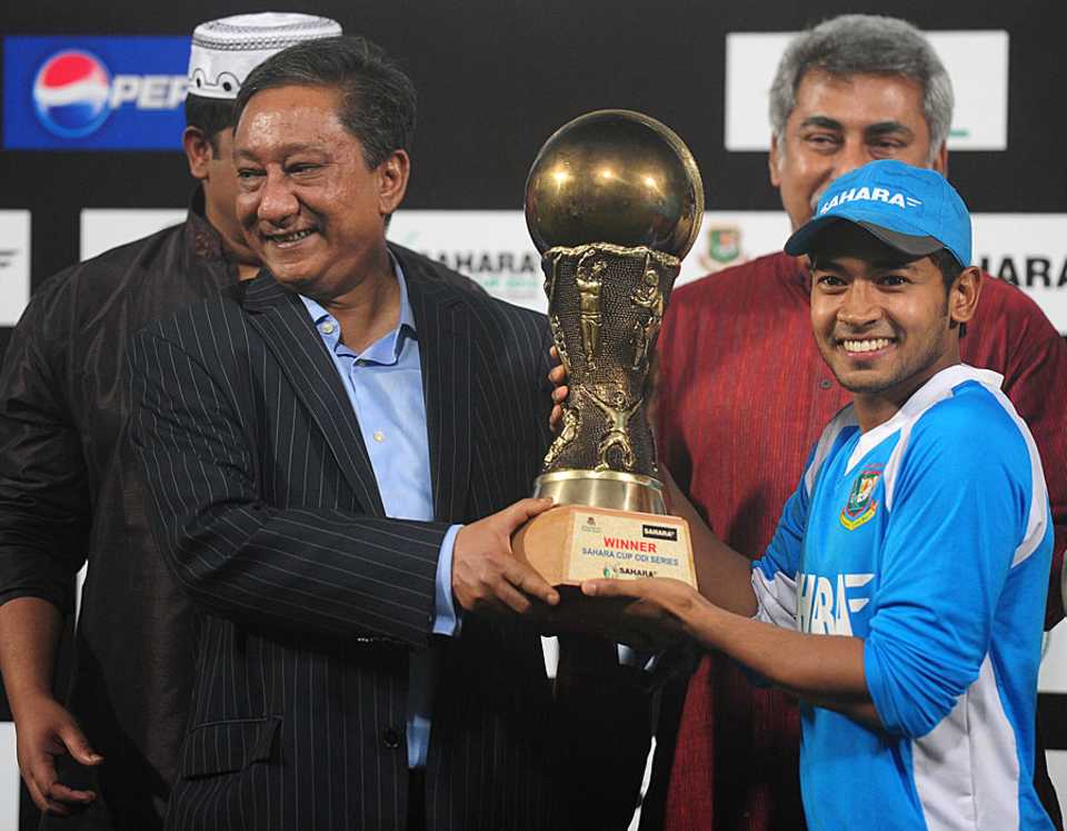 Mushfiqur Rahim holds the trophy after winning the series