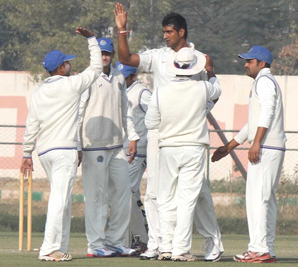 Pankaj Singh celebrates one of his five wickets with his teammates, Rajasthan v Saurashtra, Ranji Trophy, Group A, Jaipur, December 24, 2012