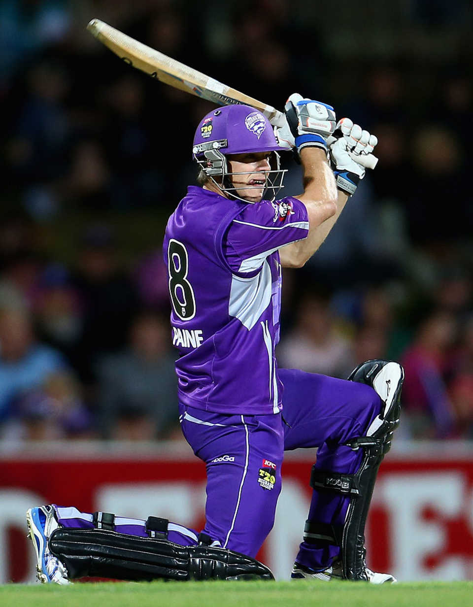 Tim Paine drives through the off side