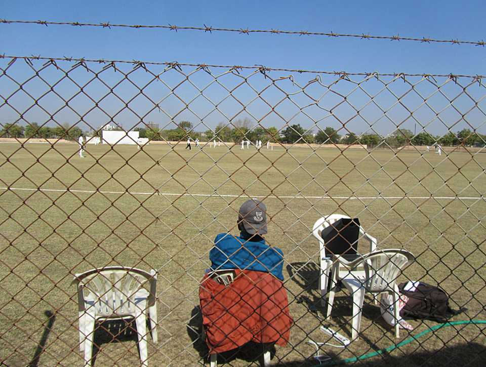 A fan from Sussex watches the Ranji Trophy quarter-final between Saurashtra and Karnataka