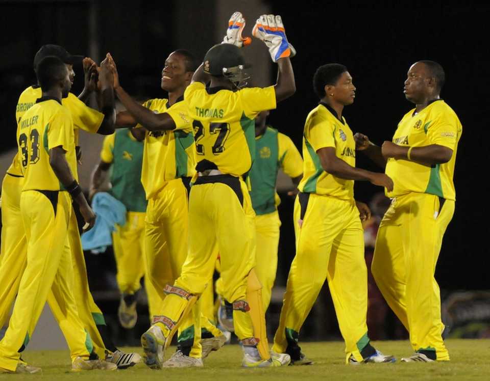 Jamaica's players celebrate a wicket