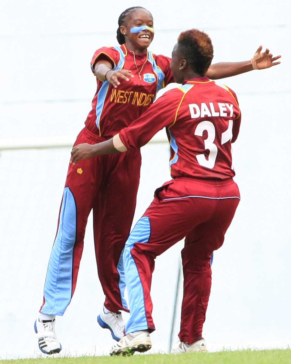 Shaquana Quintyne celebrates a wicket with Shanel Daley