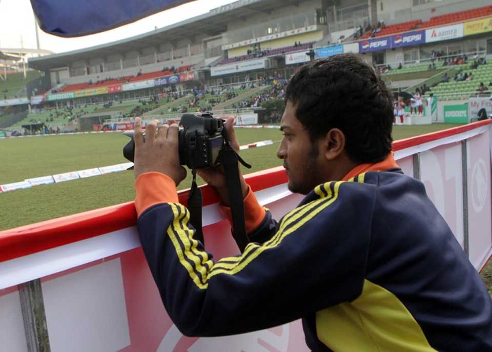 Shakib Al Hasan takes a picture on his off day