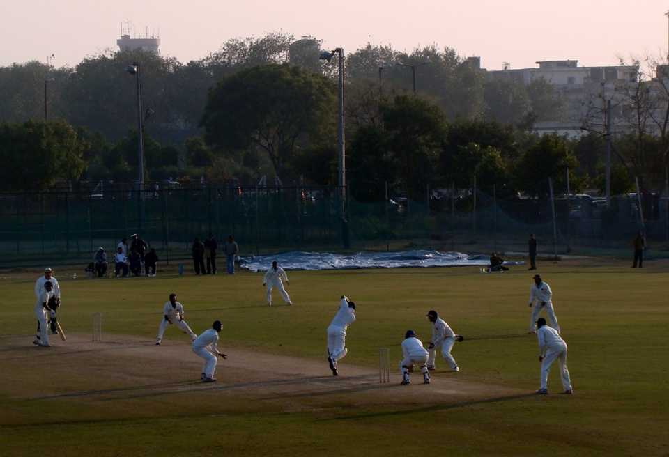 Mumbai and Services play in sombre conditions at the Palam Ground