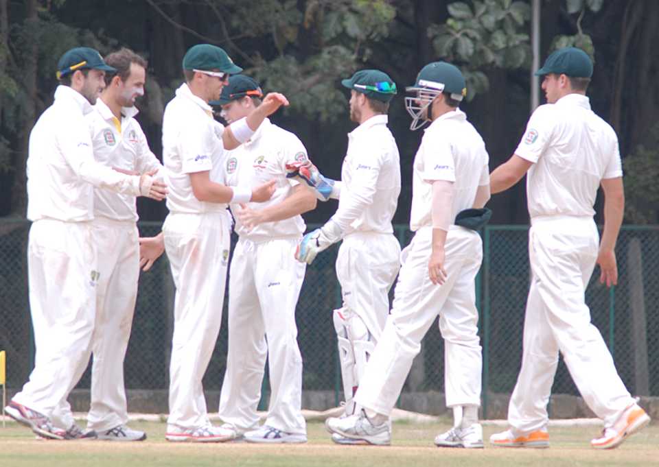 The Australians celebrate a wicket, Indian Board President's XI v Australians, 2nd day, Chennai, February 13, 2013