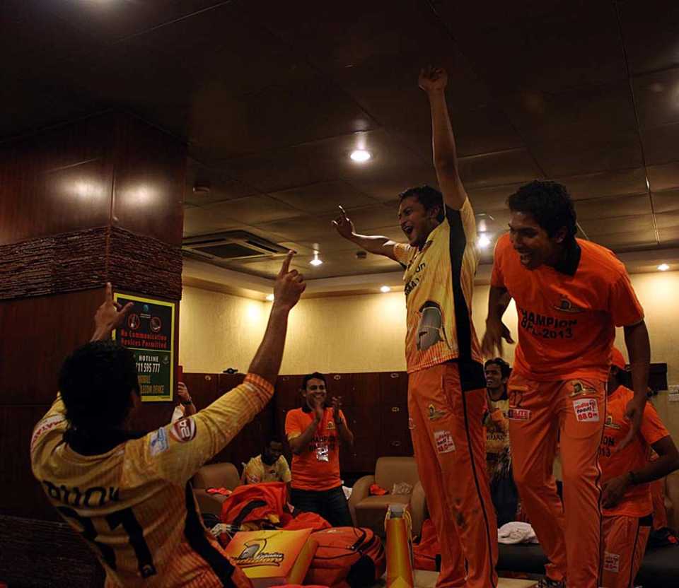 Dhaka Gladiators players celebrate their BPL win