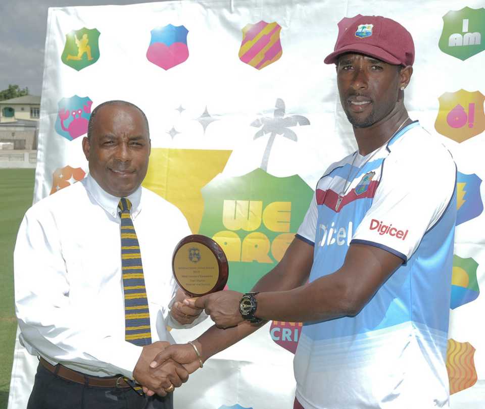 Shane Shillingford is presented with the Man-of-the-Match award, West Indies v Zimbabwe, 1st Test, Barbados, 3rd day, March 14, 2013