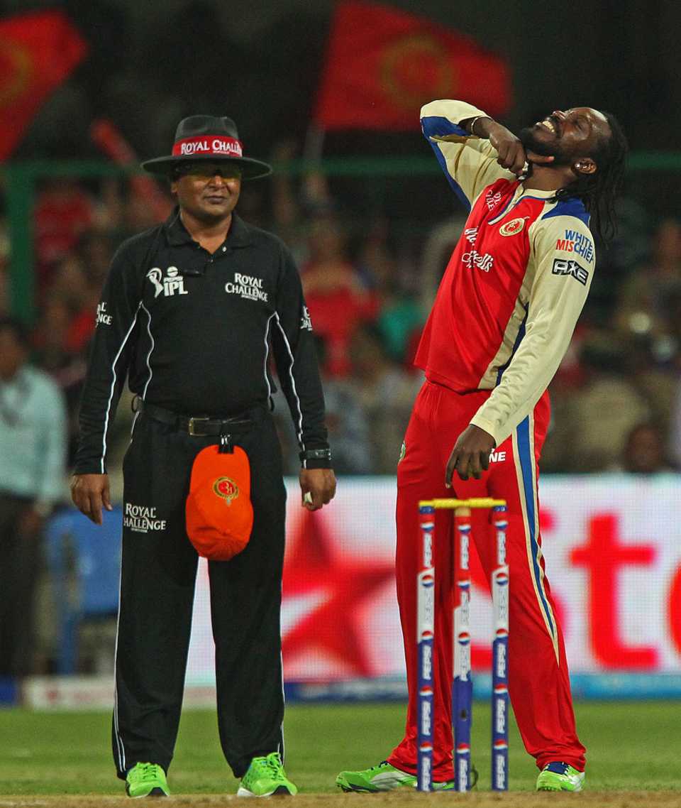 Chris Gayle signals the end of another batsman, Royal Challengers Bangalore v Pune Warriors, IPL, Bangalore, April 23, 2013