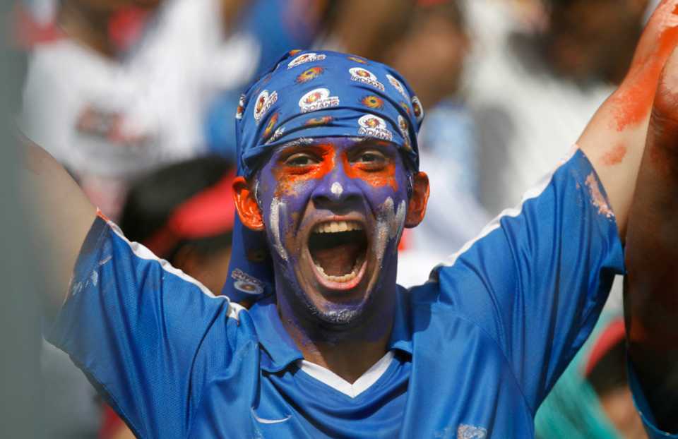 A Mumbai fan enjoys the game