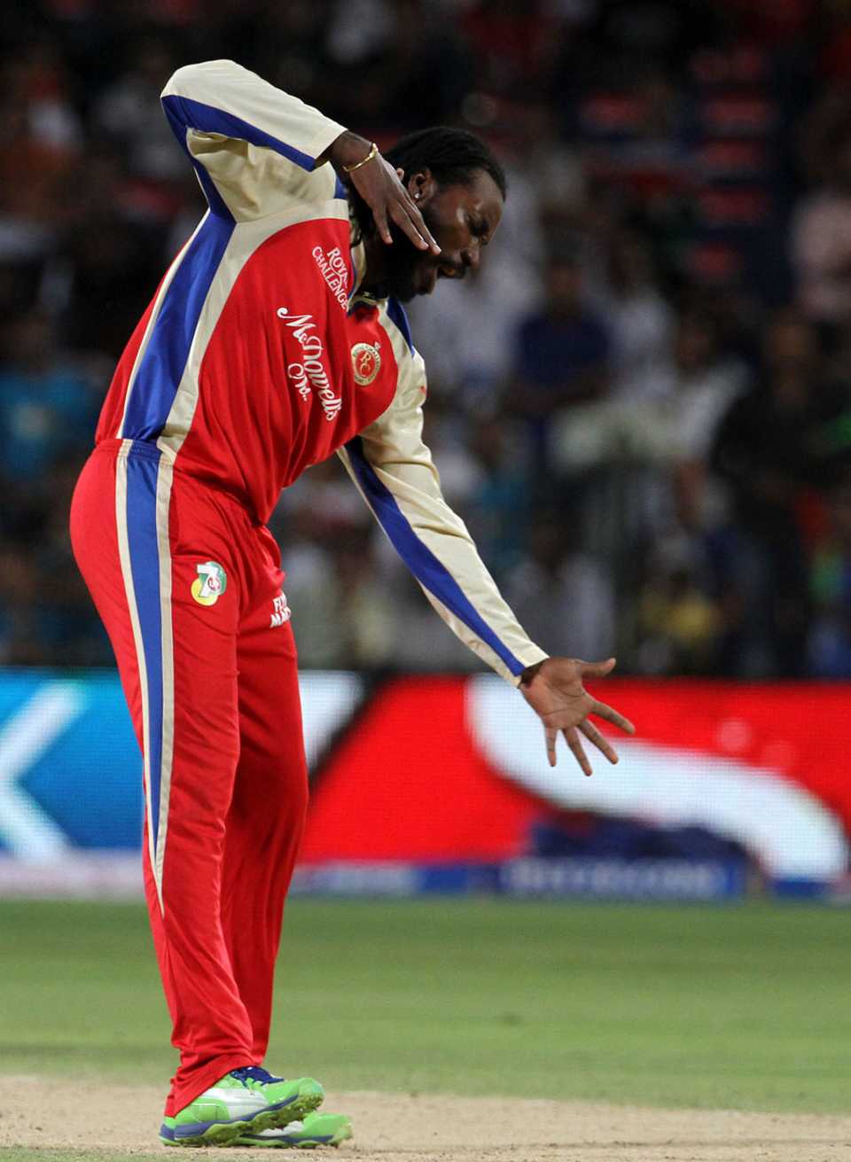 Chris Gayle pulls out another of his unique celebrations, Pune Warriors v Royal Challengers Bangalore, IPL 2013, Pune, May 2, 2013