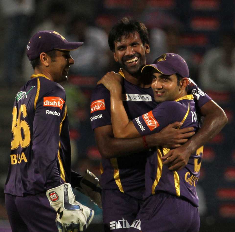 Gautam Gambhir and L Balaji celebrate the last wicket
