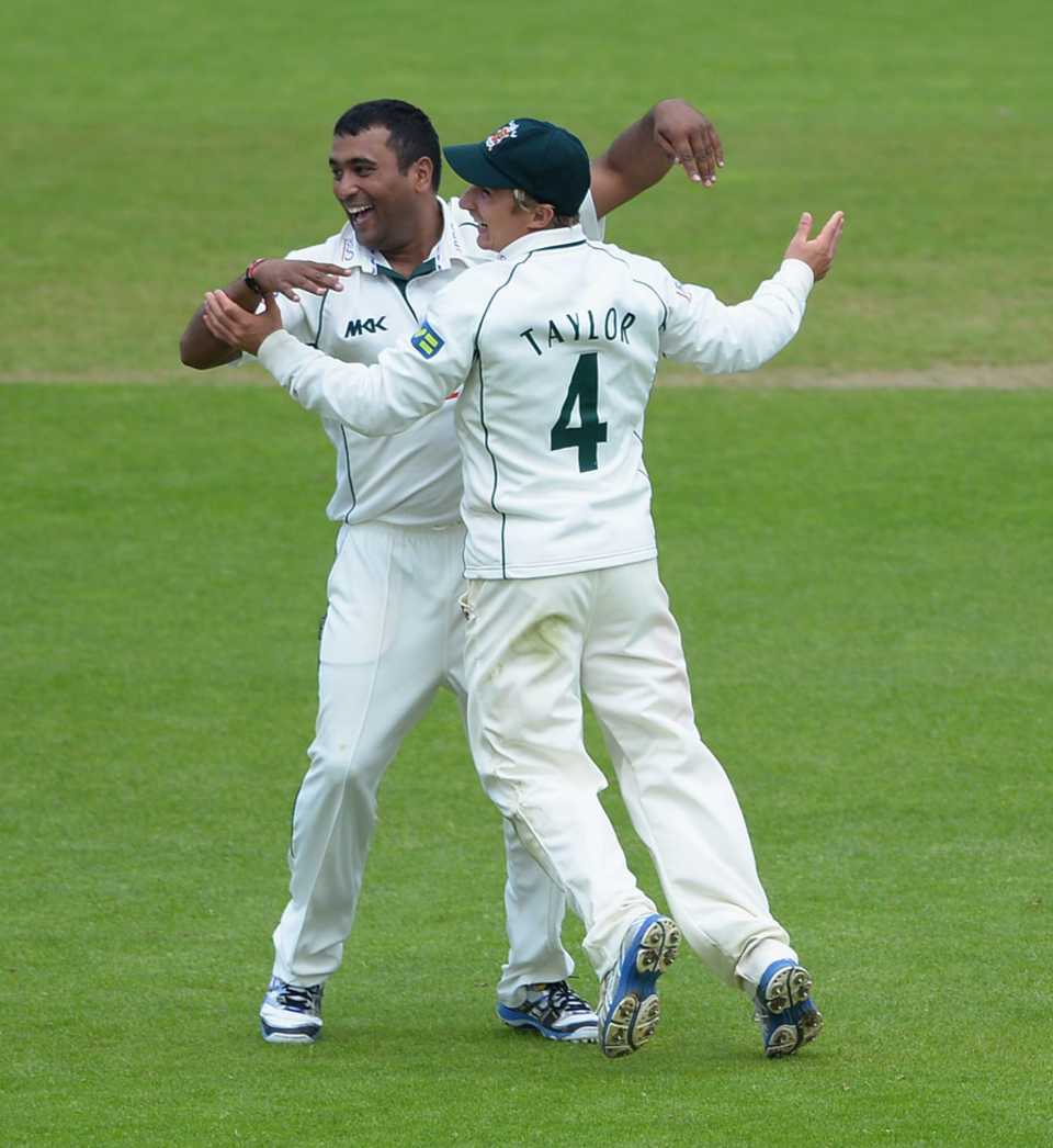 Samit Patel and James Taylor celebrate a wicket
